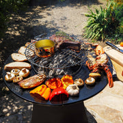 REVO Vulcan Cooking Fire Pit – Wood & Charcoal with Enamelled Cast Iron Plancha